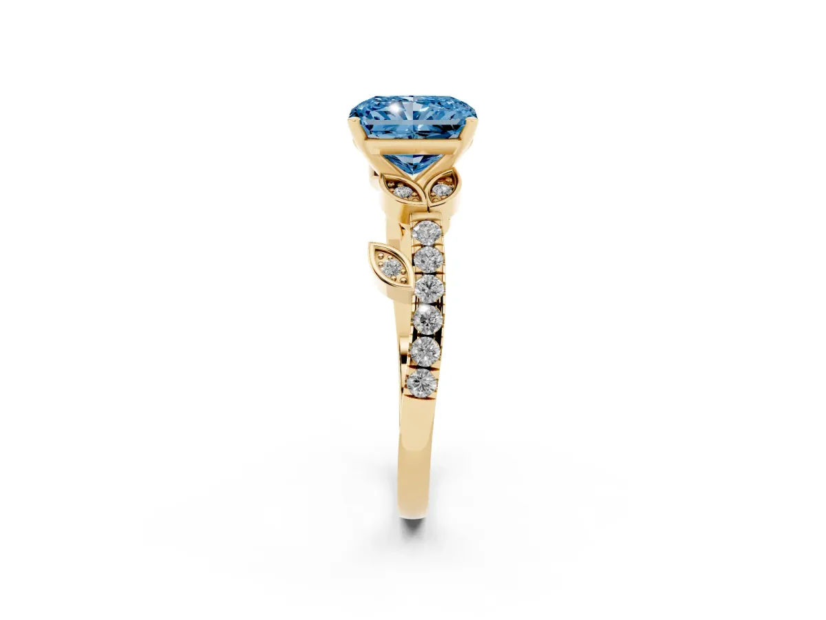 Fancy Blue Radiant Cut Solitaire Leaf-Inspired Diamond Ring with Pavé Band and Four-Prong Setting Yellow gold