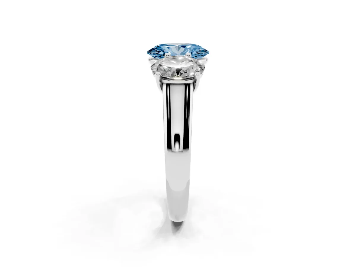 Fancy Blue Oval Cut Three-Stone Diamond Ring with Prong Setting on a Classic Band Platinum