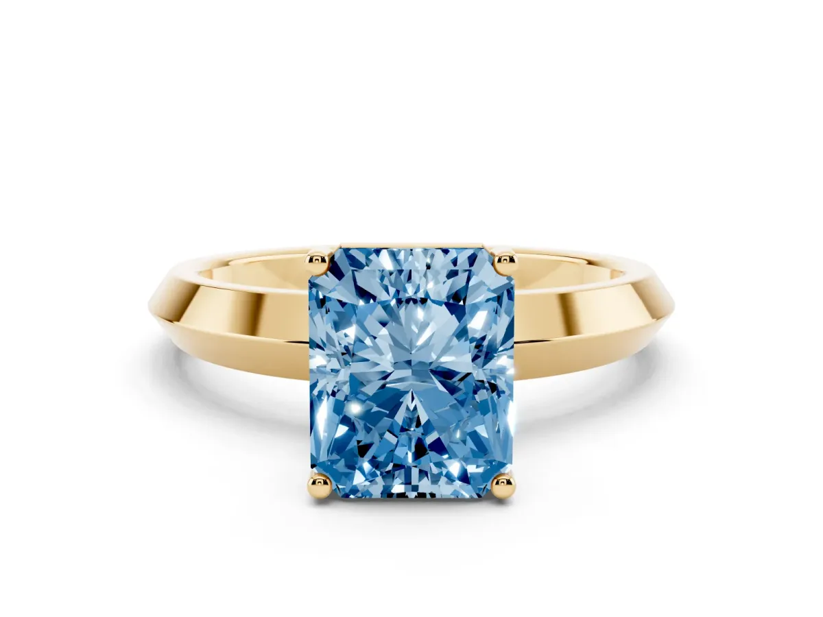 Fancy Blue Radiant Cut Cut Solitaire Engagement Ring with Flat Band and Four-Prong Setting Yellow gold