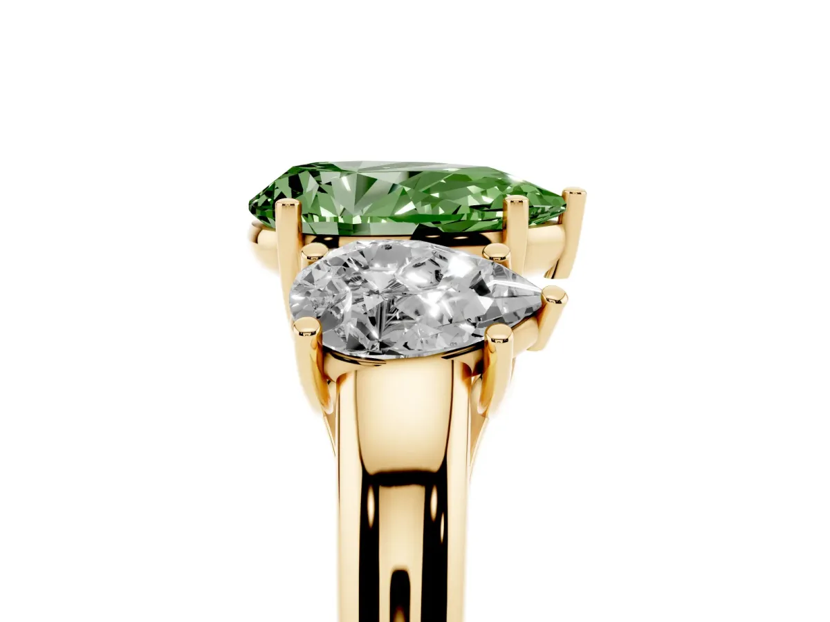 Fancy Green Three-Stone Pear Cut Diamond Engagement Ring with Prong Setting Yellow gold