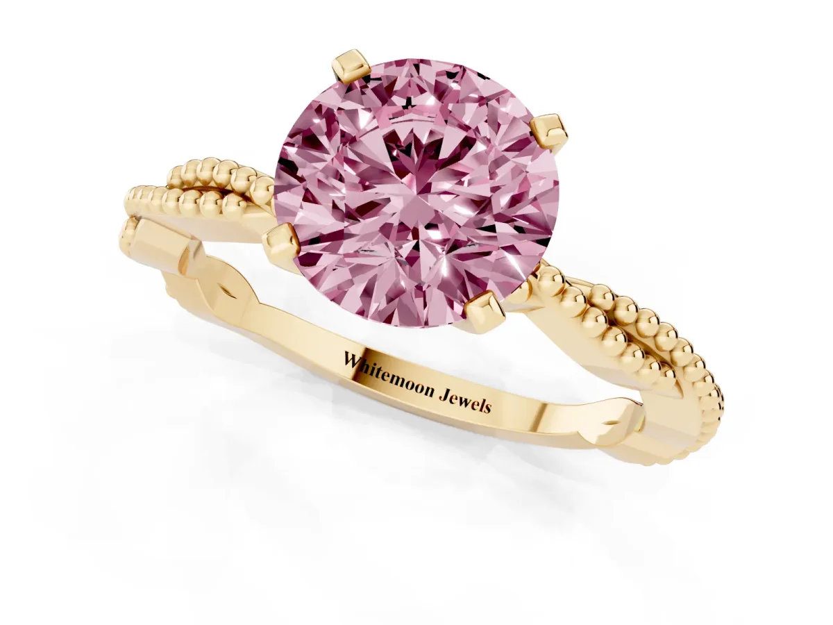 Fancy Pink Round Cut Solitaire Twisted Band with Bead Prong Setting Yellow gold