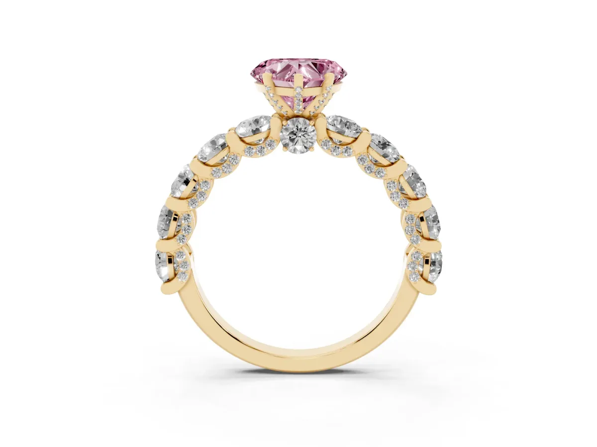 Fancy Pink Heart Cut Diamond Side Stone Engagement Ring with Four-Prong Setting Yellow gold