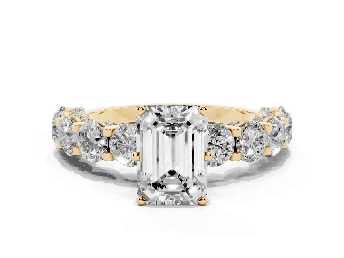 Emerald Cut Diamond Side Stone Engagement Ring with Four-Prong Setting Yellow gold