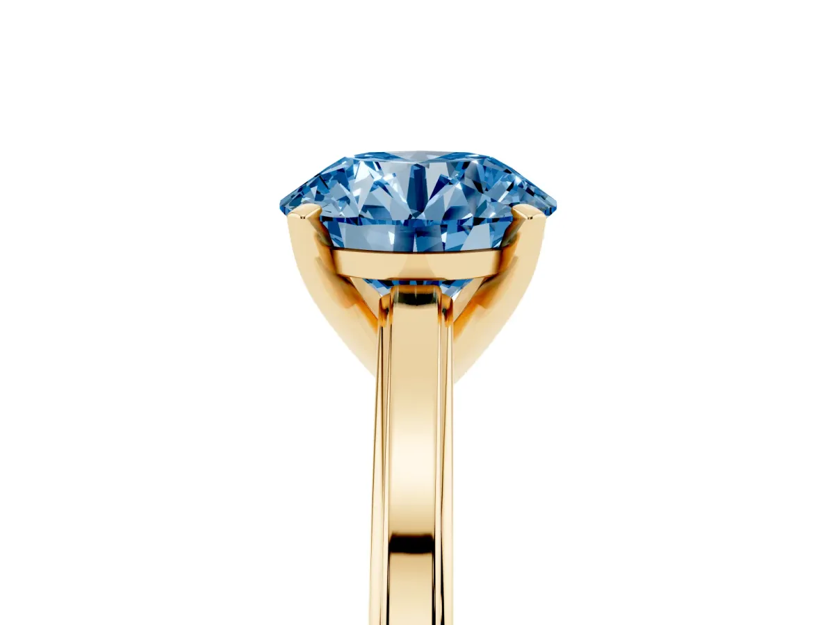Fancy Blue Round Cut Solitaire Diamond Ring with Four-Prong Setting and Classic Band Yellow gold