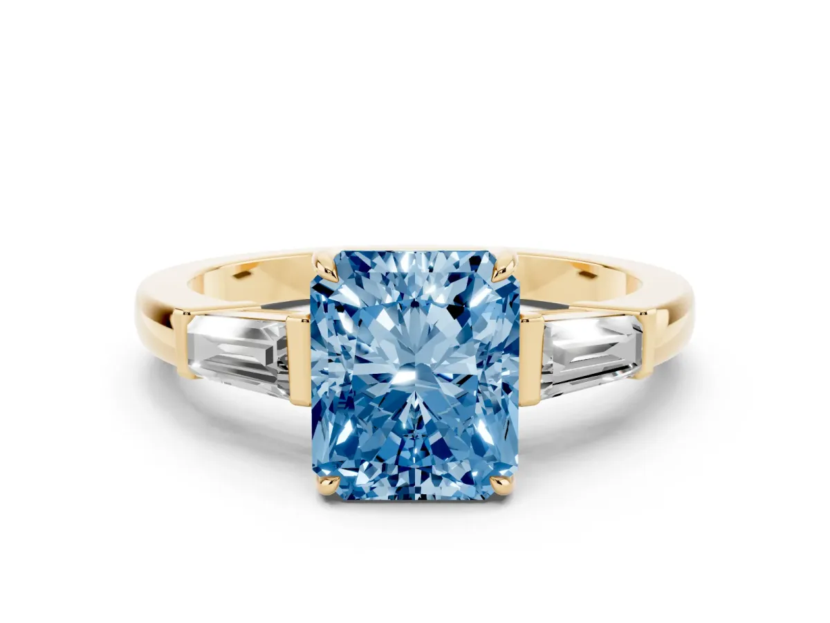 Fancy Blue Radiant Cut Diamond Three-Stone Ring with Tapered Baguette Side Stones and Prong Setting Yellow gold