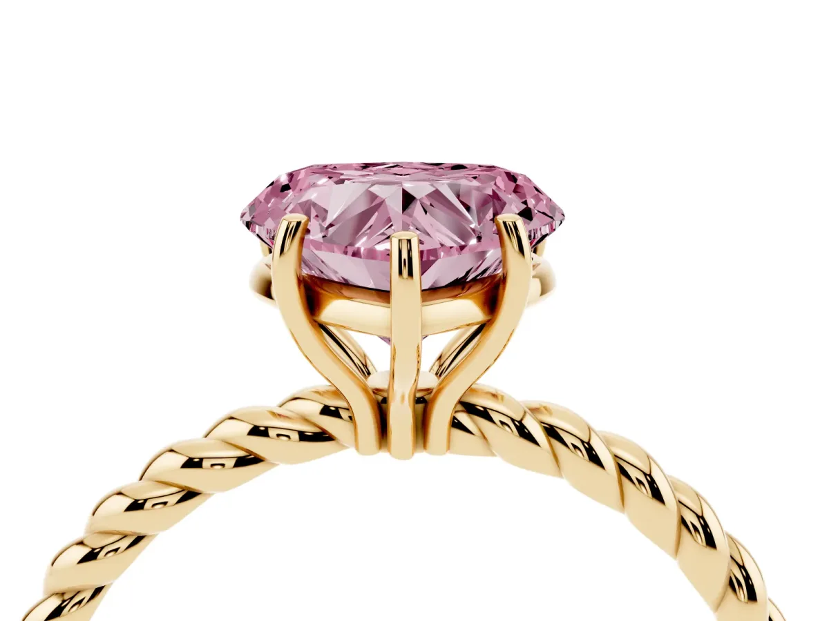 Fancy Pink Heart Cut Solitaire Twist Band Ring with Four-Prong Setting Yellow gold
