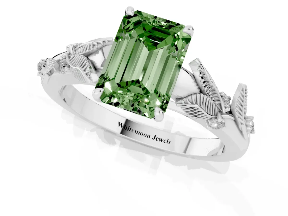 Fancy Green Emerald Cut Diamond Solitaire Ring with Leaf Motif Band and Four-Prong Setting Silver