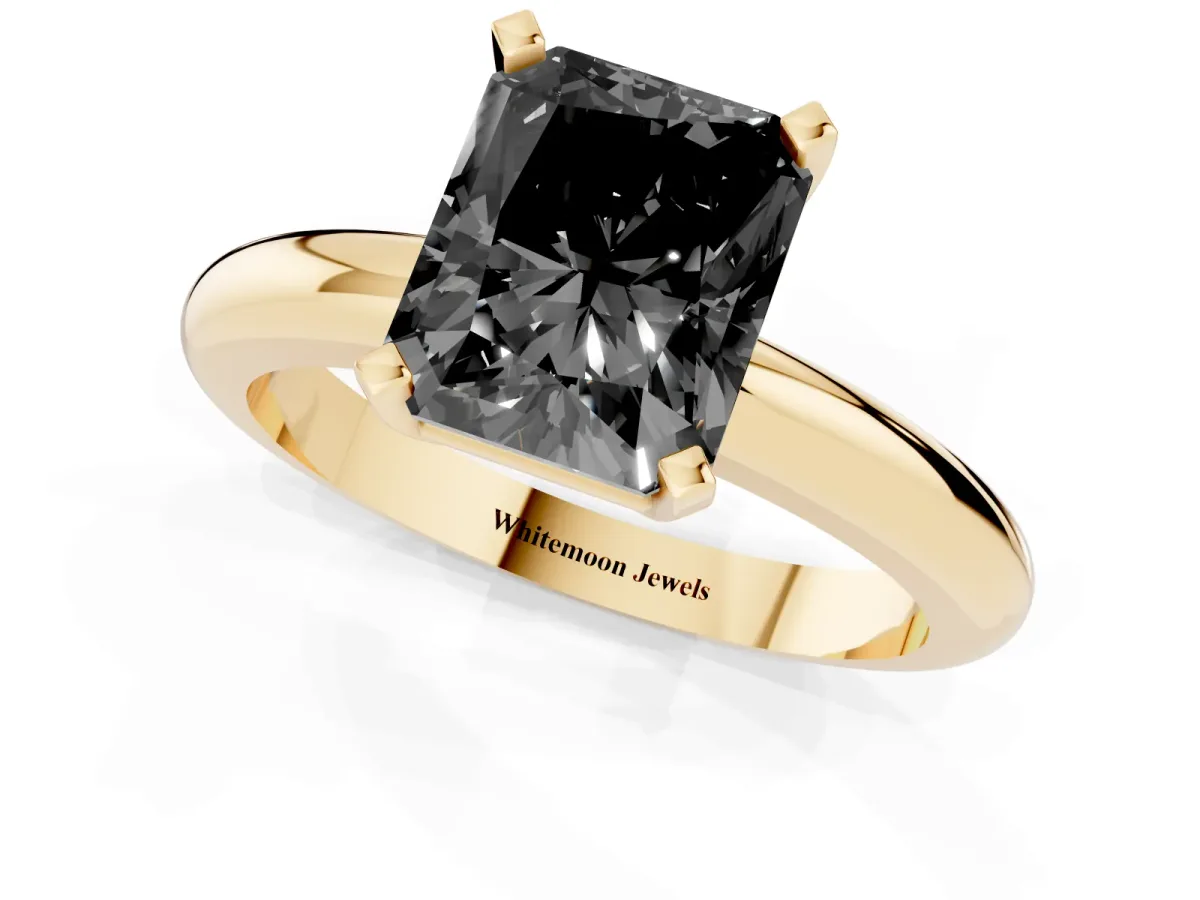 Fancy Black Radiant Cut Diamond Solitaire Engagement Ring with Round Band and Four-Prong Setting Yellow gold