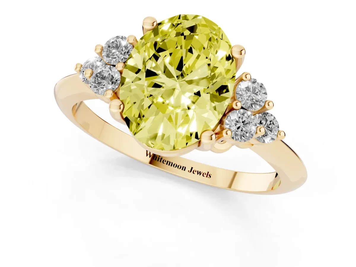 Fancy Yellow Oval Cut Cut Diamond Cluster Ring with Solitaire Band and Four-Prong Setting Yellow gold