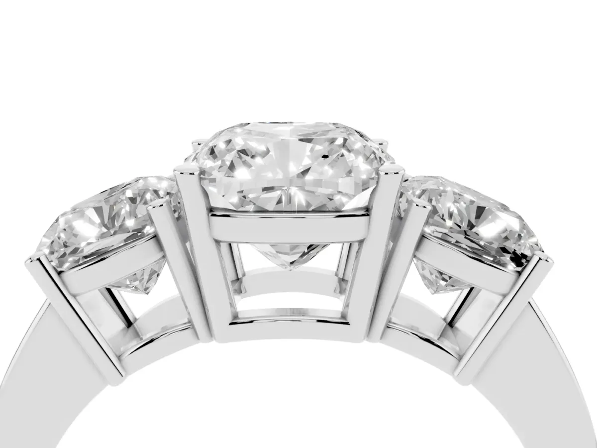 Three-Stone Cushion Cut Cut Diamond Engagement Ring with Flat Band and Four-Prong Setting Silver