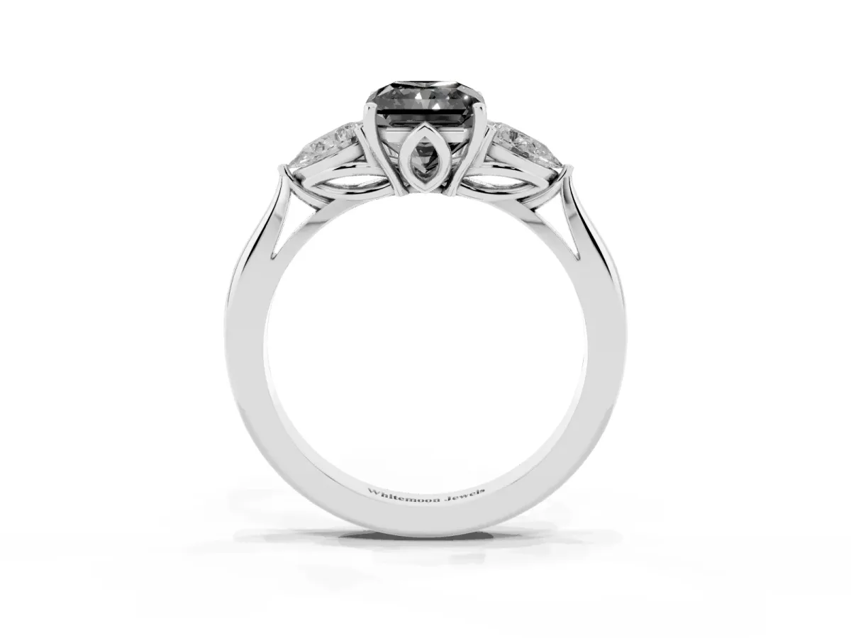 Fancy Black Radiant Cut Diamond Three-Stone Ring with Pear Side Stones and Prong Setting Platinum