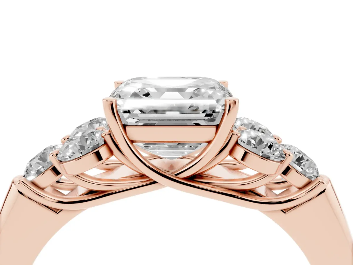 Asscher Cut Cut Diamond Cluster Ring with Round Accent Stones and Prong Setting on a Classic Band Rose gold