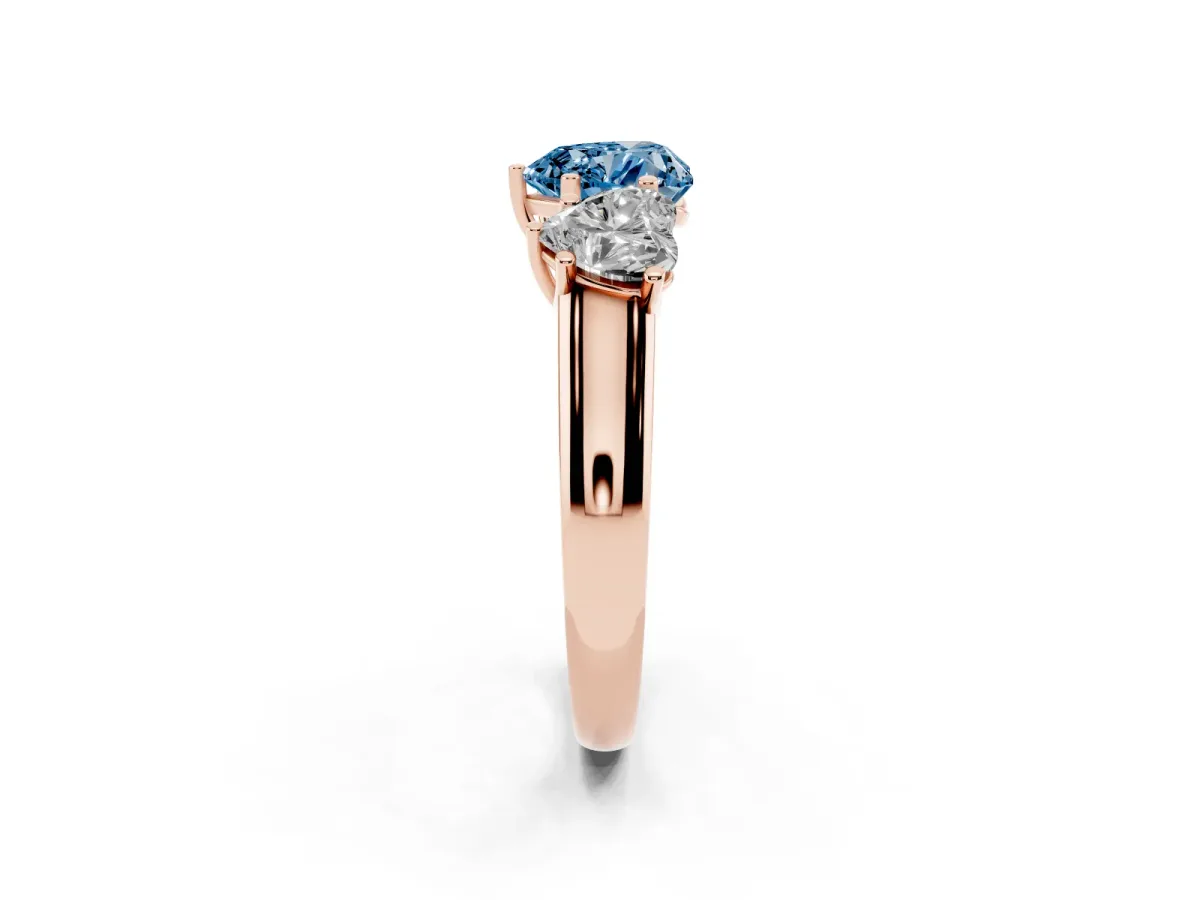 Fancy Blue Heart Cut Three-Stone Diamond Ring with Prong Setting on a Classic Band Rose gold