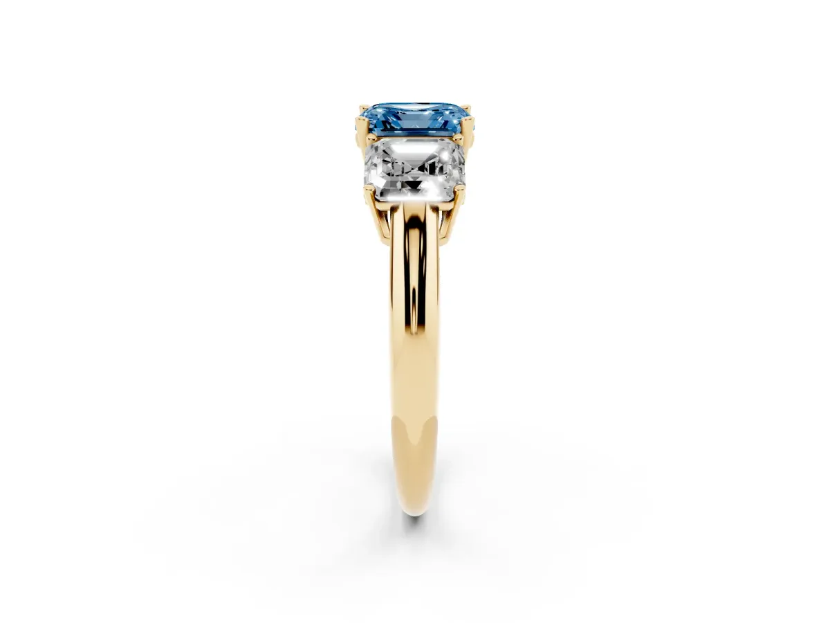 Fancy Blue Three-Stone Asscher Cut Cut Diamond Engagement Ring with Prong Setting on a White Gold Band Yellow gold