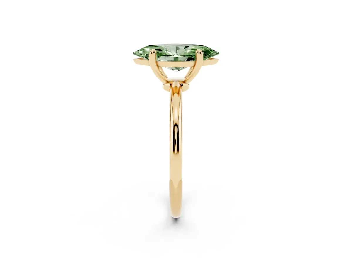 Fancy Green Marquise Cut Solitaire Diamond Ring with 4-Prong Setting on a Classic Band Yellow gold