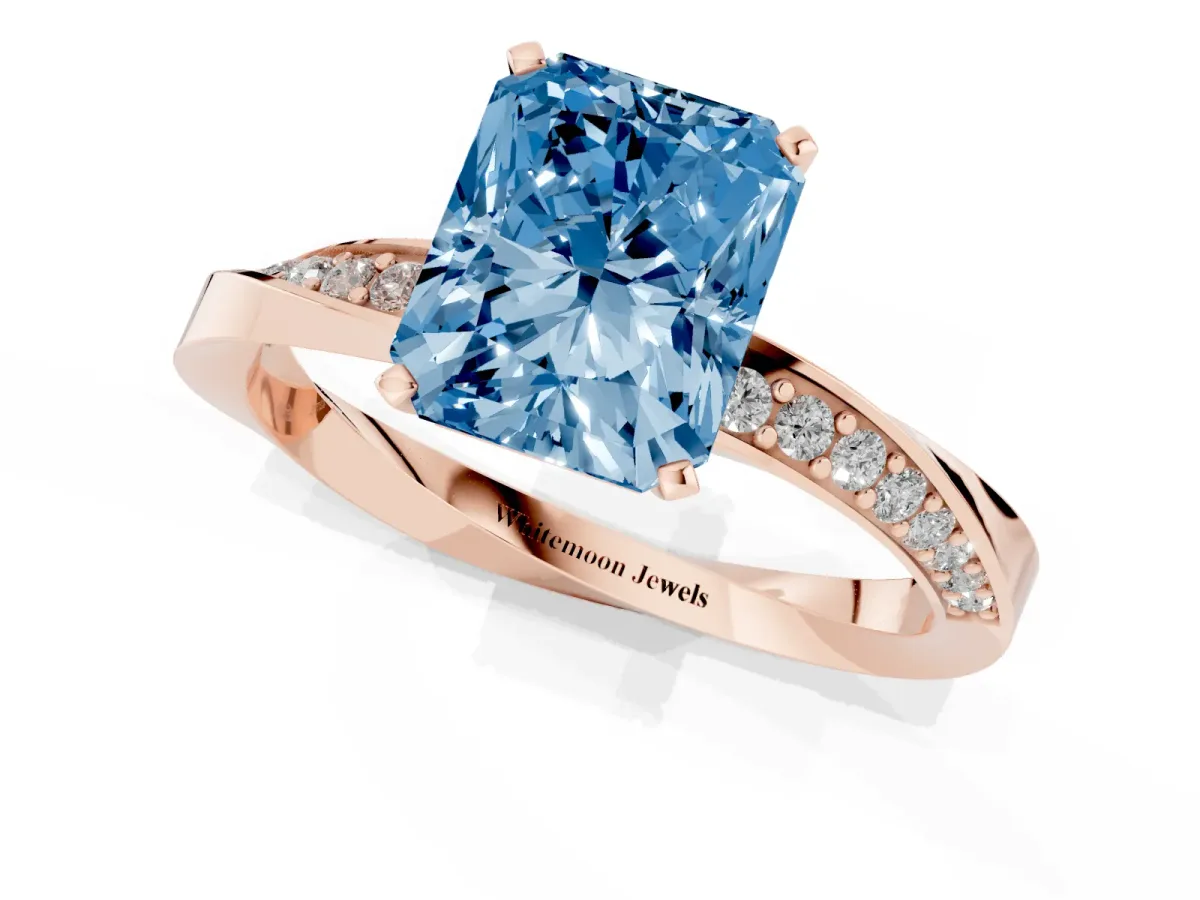 Fancy Blue Radiant Cut Diamond Engagement Ring with Side Stone Accents and Four-Prong Setting Rose gold