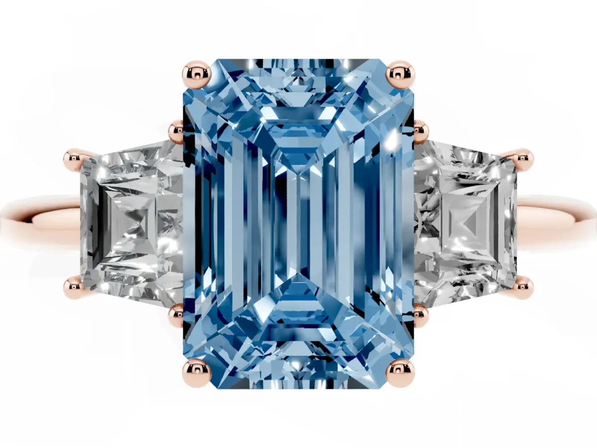 Fancy Blue Emerald Cut Diamond Three-Stone Ring with Trapezoid Side Stones and Prong Setting Rose gold
