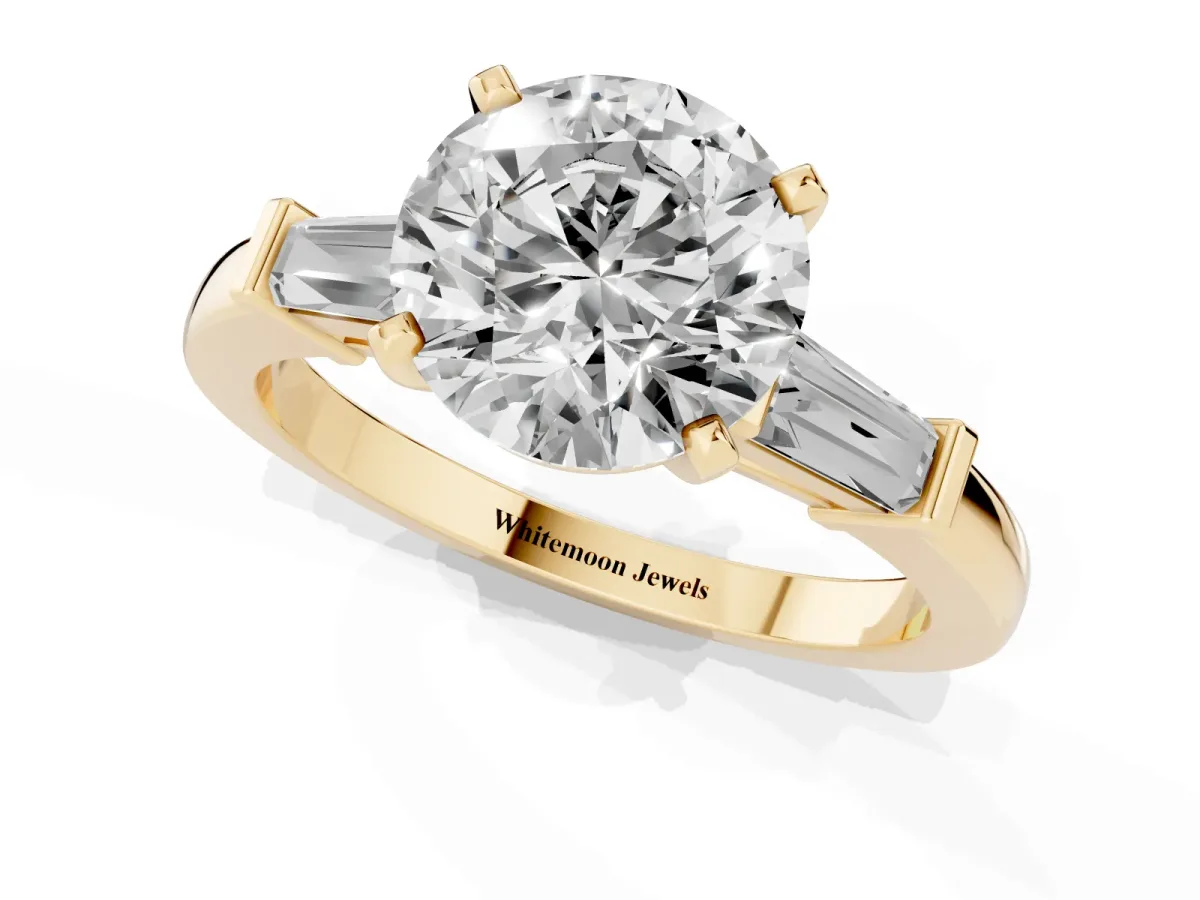 Round Cut Cut Diamond Solitaire Ring with Tapered Baguette Accents and Four-Prong Setting Yellow gold