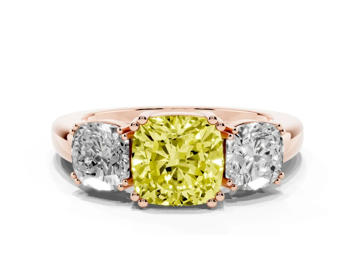 Fancy Yellow Three-Stone Cushion Cut Cut Diamond Ring with Channel Set Band and Four-Prong Setting Rose gold