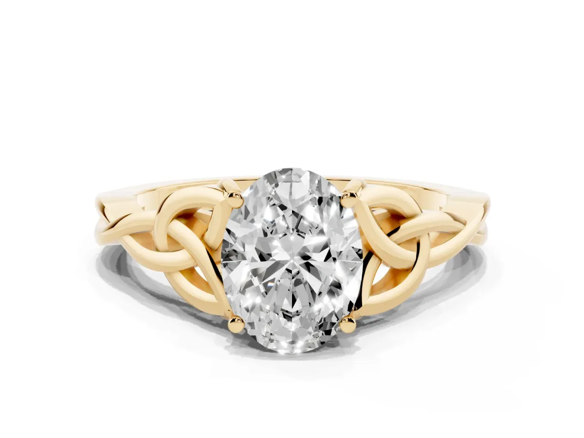 Oval Cut Diamond Solitaire Engagement Ring with Celtic Knot Band and Four-Prong Setting Yellow gold
