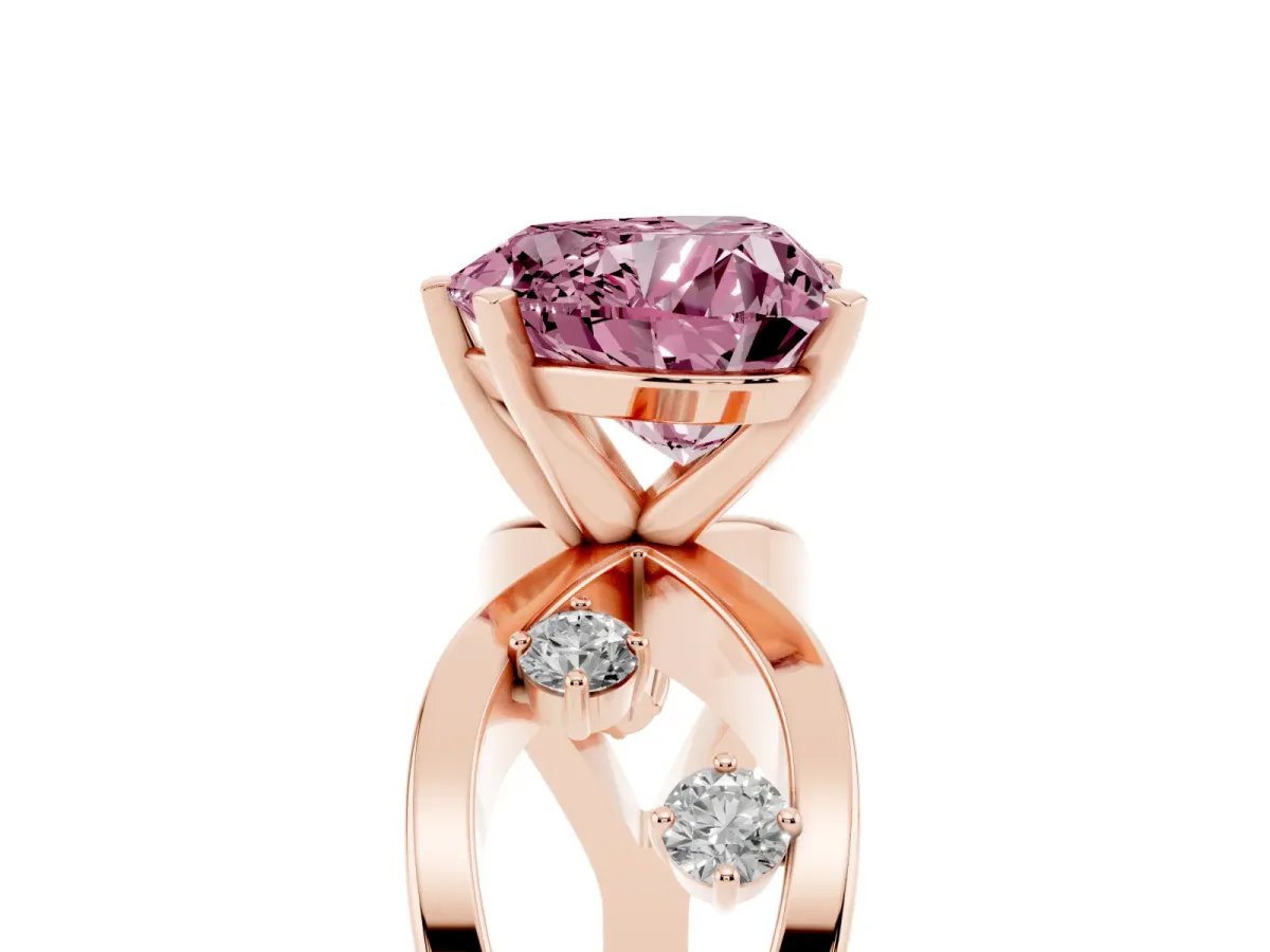 Fancy Pink Heart Cut Cut Solitaire Diamond with Side Stones on Criss-Cross Band and Four-Prong Setting Rose gold
