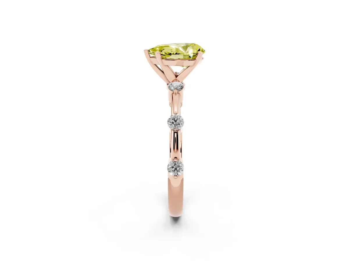 Fancy Yellow Pear Cut Solitaire Diamond Ring with Bezel Set Side Stones and Prong Setting Rose gold