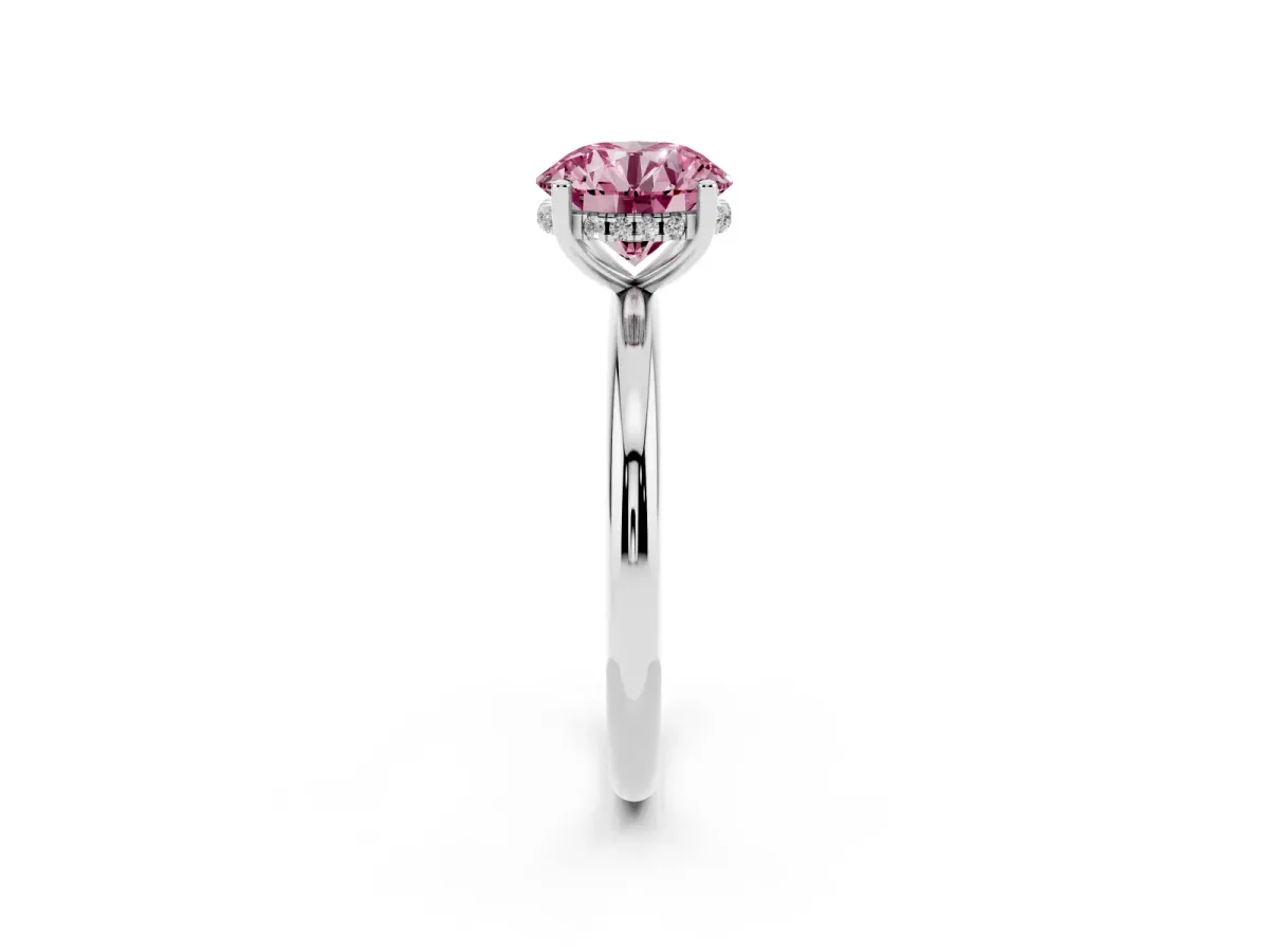 Fancy Pink Round Cut Cut Solitaire Engagement Ring with Four-Prong Setting and Classic Band Silver