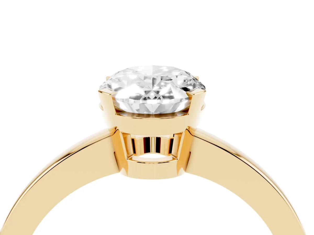 Oval Cut Cut Solitaire Ring with Four-Prong Setting and Classic Band Yellow gold