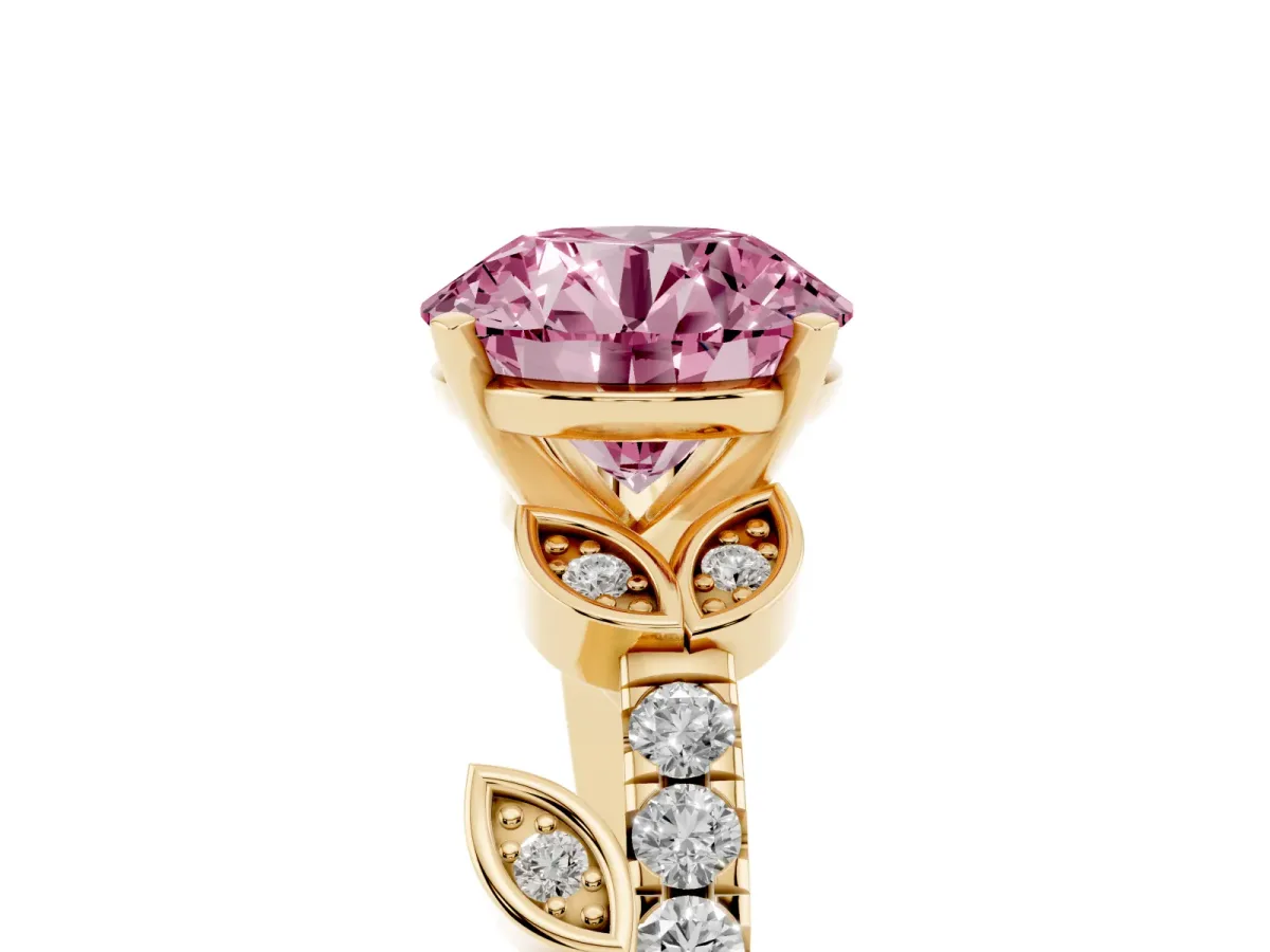 Fancy Pink Round Cut Solitaire Leaf-Inspired Diamond Ring with Pavé Band and Four-Prong Setting Yellow gold