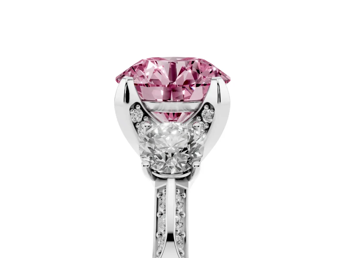 Fancy Pink Round Cut Brilliant Three-Stone Diamond Ring with Pavé Band and Four-Prong Setting White gold