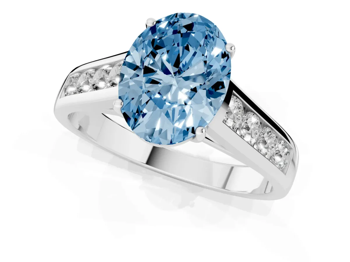 Fancy Blue Oval Cut Solitaire Channel-Set Diamond Engagement Ring with Four-Prong Setting Silver