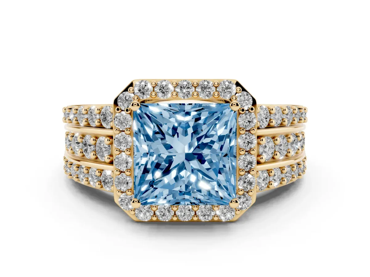 Fancy Blue Princess Cut Halo Diamond Ring with Round Split Shank and Prong Setting Yellow gold