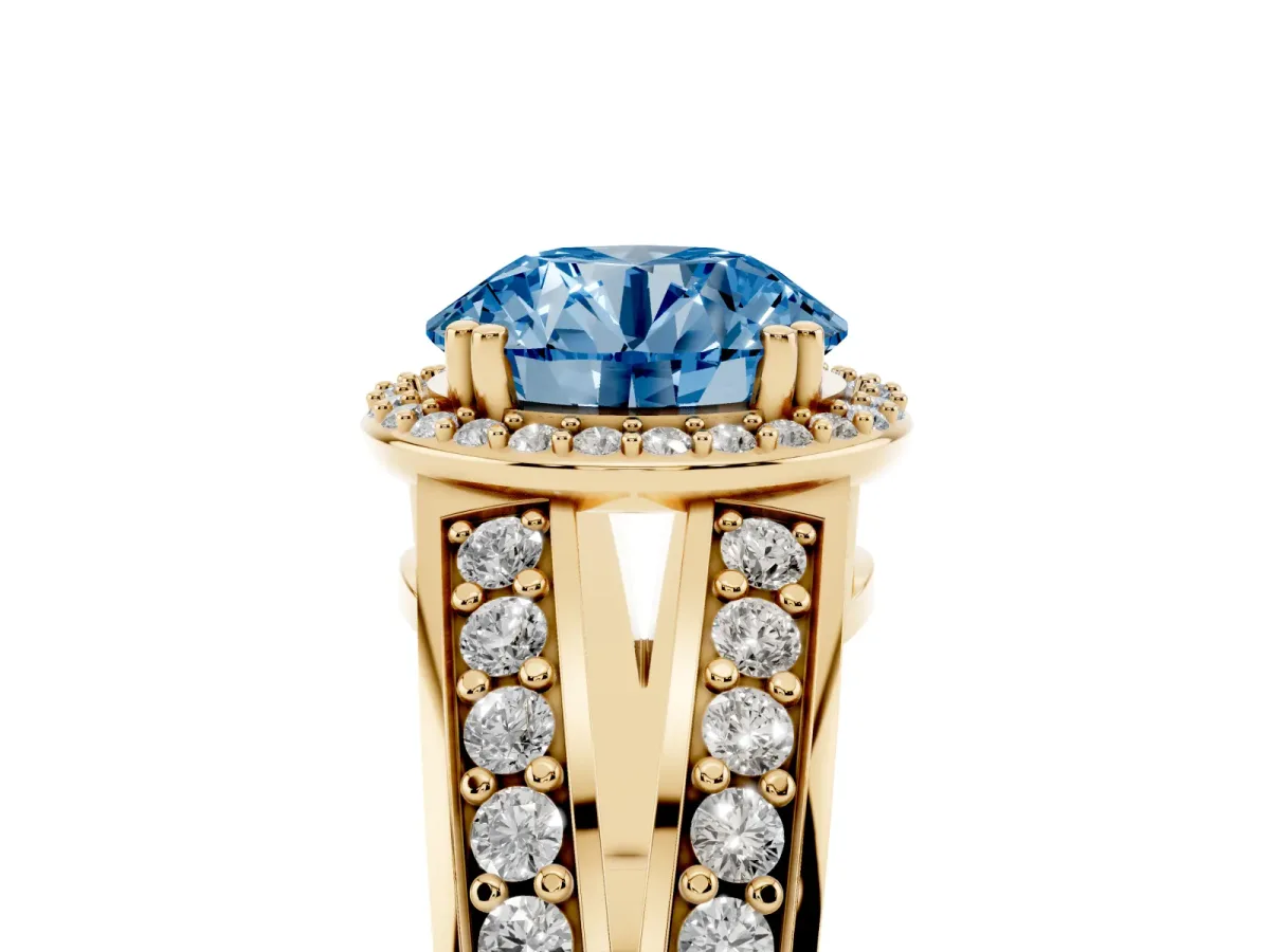 Fancy Blue Round Cut Diamond Halo Ring with Split Shank Pavé Band and Four-Prong Setting Yellow gold