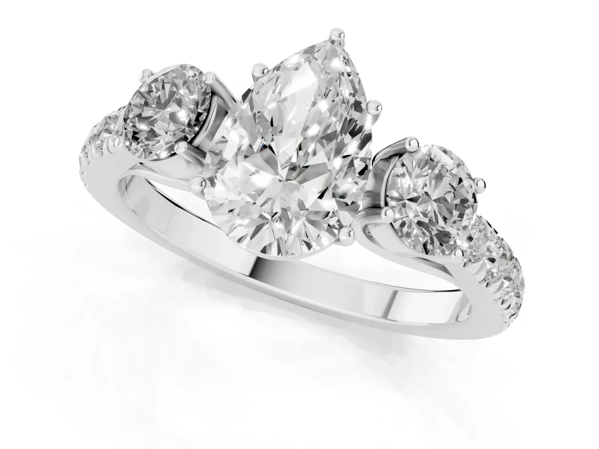 Pear Cut Cut Diamond Three-Stone Ring with Round Side Stones and Pavé Band Silver