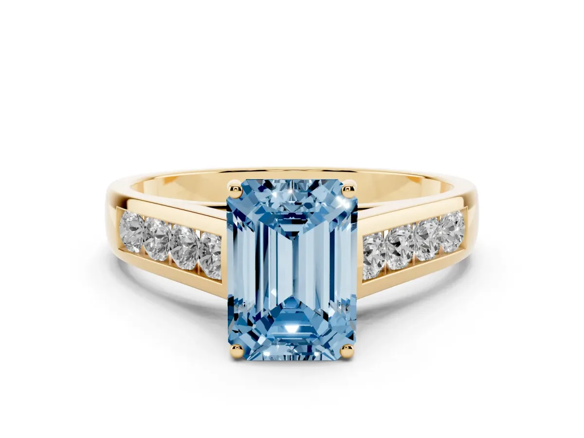 Fancy Blue Emerald Cut Brilliant Channel-Set Solitaire Ring with Four-Prong Setting Yellow gold