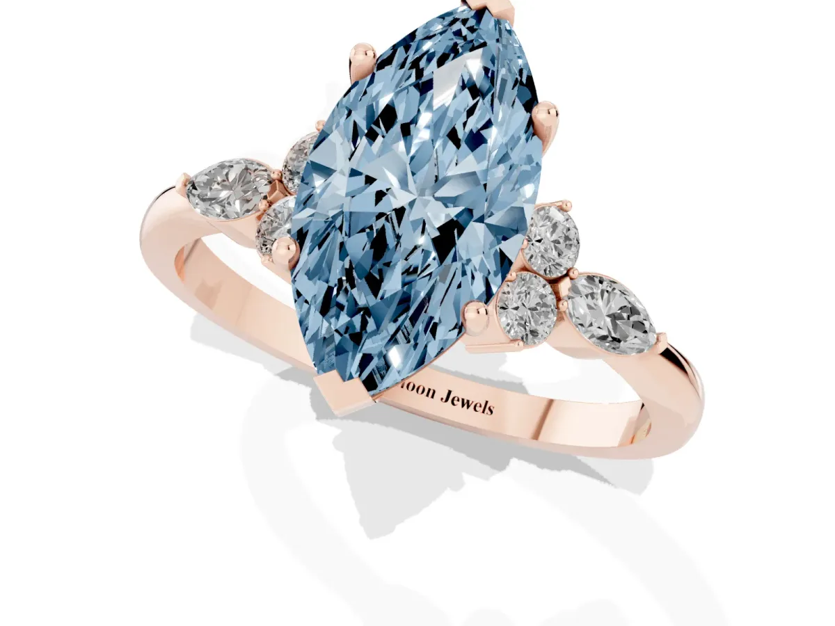 Fancy Blue Marquise Cut Brilliant Diamond Solitaire Ring with Pear Side Stones and Four-Prong Setting Rose gold