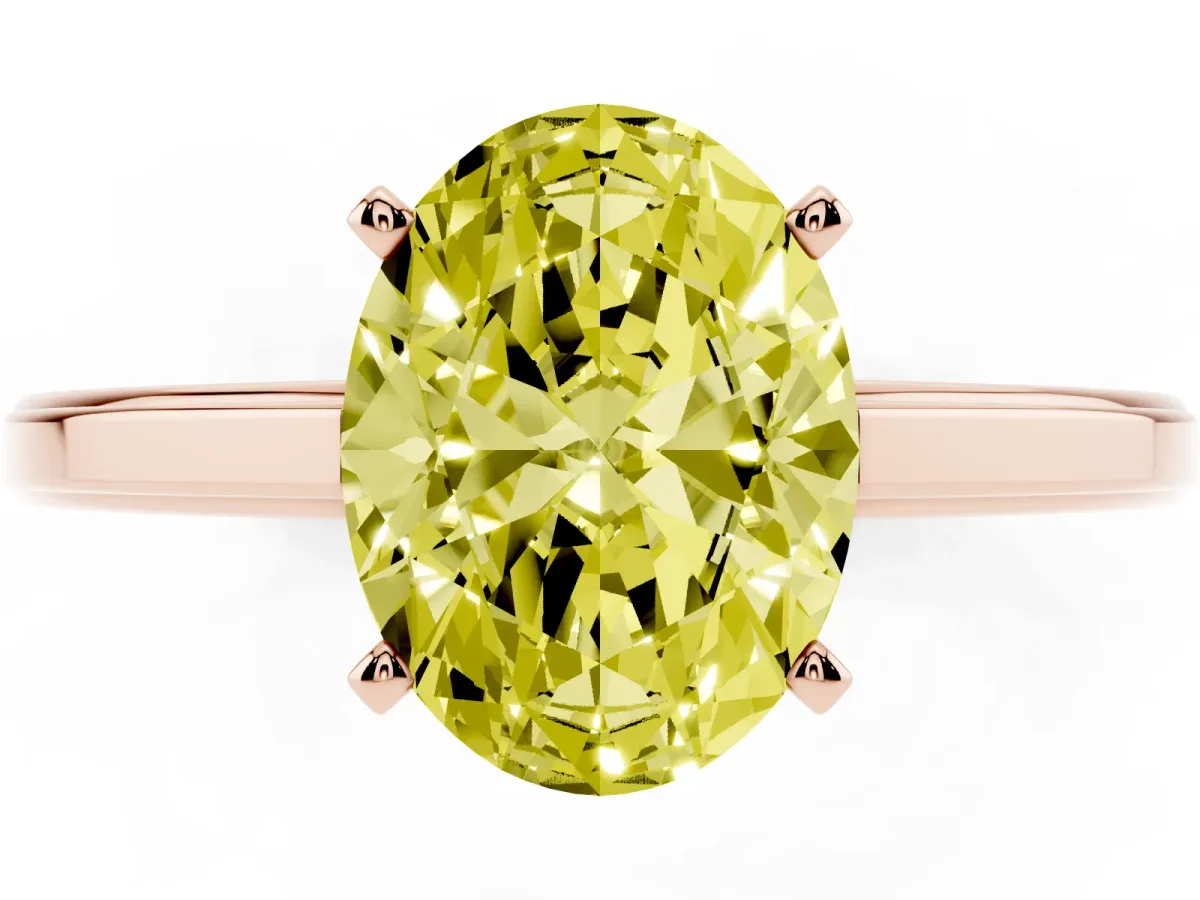 Fancy Yellow Oval Cut Solitaire Diamond Ring with Four-Prong Setting and Classic Band Rose gold