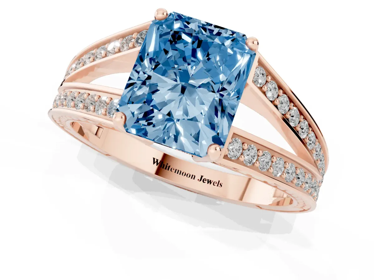 Fancy Blue Radiant Cut Diamond Split Shank Ring with Pavé Band and Four-Prong Setting Rose gold