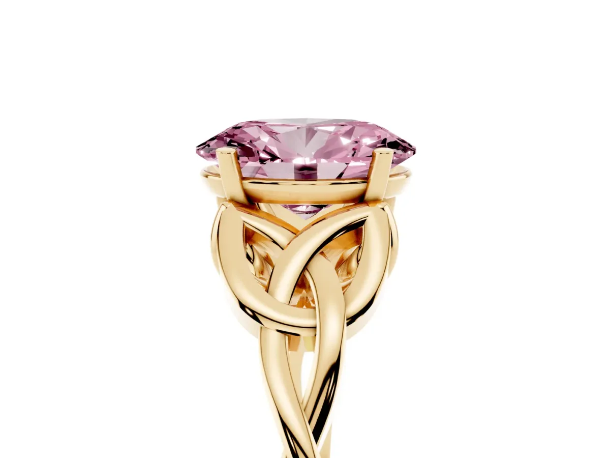 Fancy Pink Oval Cut Diamond Solitaire Engagement Ring with Celtic Knot Band and Four-Prong Setting Yellow gold