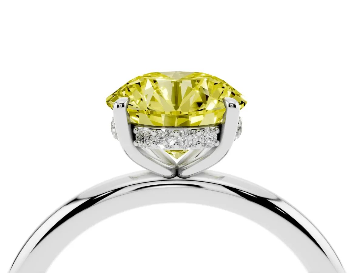 Fancy Yellow Round Cut Diamond Solitaire Ring with Thin Band and Four-Prong Setting Platinum