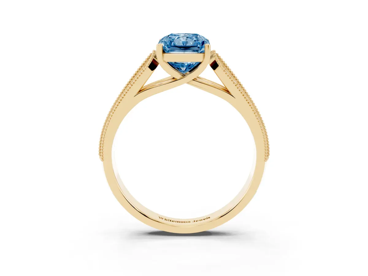 Fancy Blue Radiant Cut Cut Pave Split Shank Engagement Ring with Four-Prong Setting Yellow gold