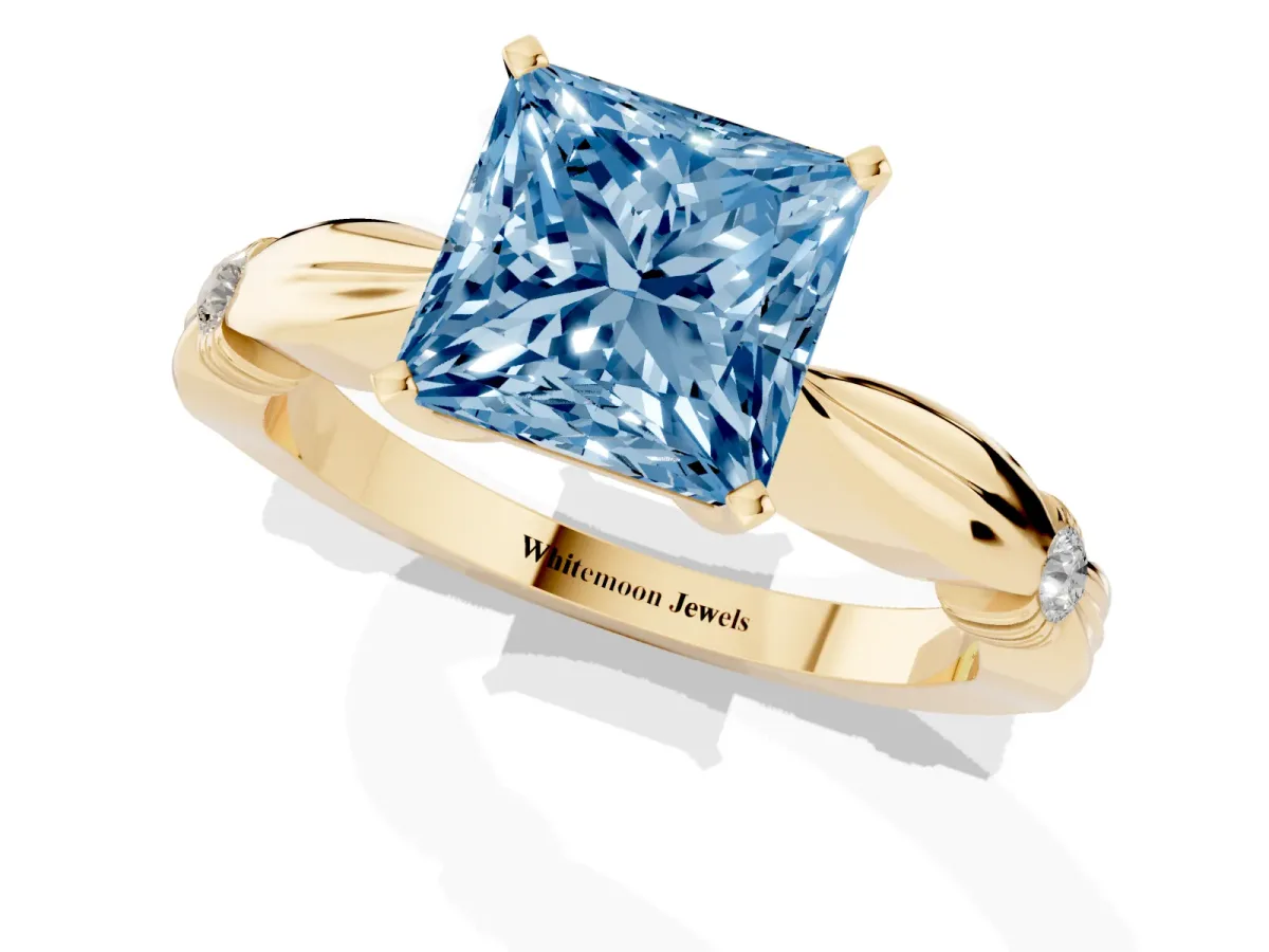 Fancy Blue Princess Cut Solitaire Diamond Twisted Band with Four-Prong Setting Yellow gold
