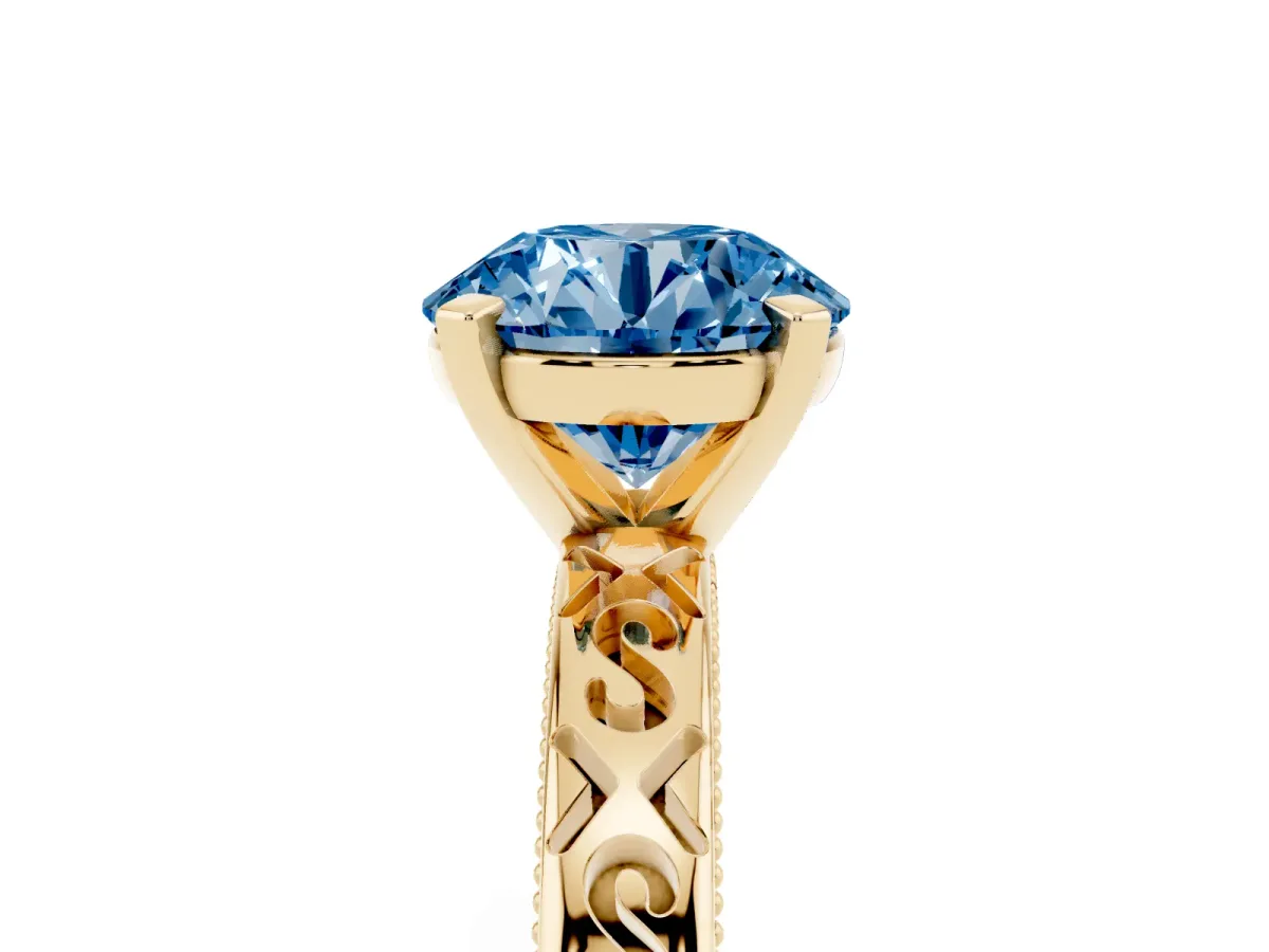 Fancy Blue Round Cut Solitaire Engagement Ring with Scrollwork Band and Four-Prong Setting Yellow gold