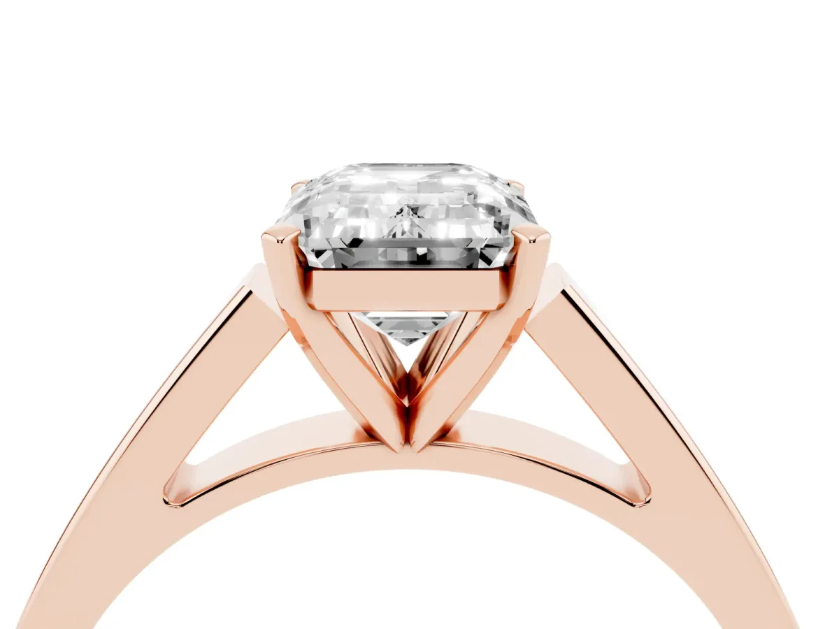Emerald Cut Solitaire Engagement Ring with Four-Prong Setting and Tapered Band Rose gold