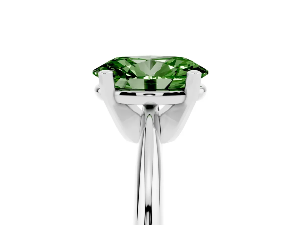 Fancy Green Oval Cut Cut Solitaire Ring with Four-Prong Setting on a Classic Band Silver