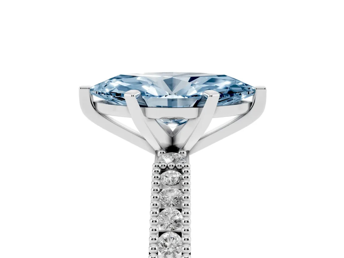 Fancy Blue Marquise Cut Solitaire with Pavé Band and Four-Prong Setting Silver