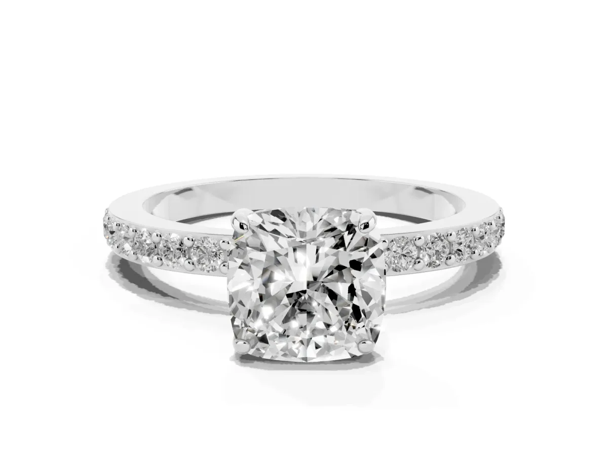 Cushion Cut Diamond Solitaire Engagement Ring with Pavé Band and Four-Prong Setting Silver