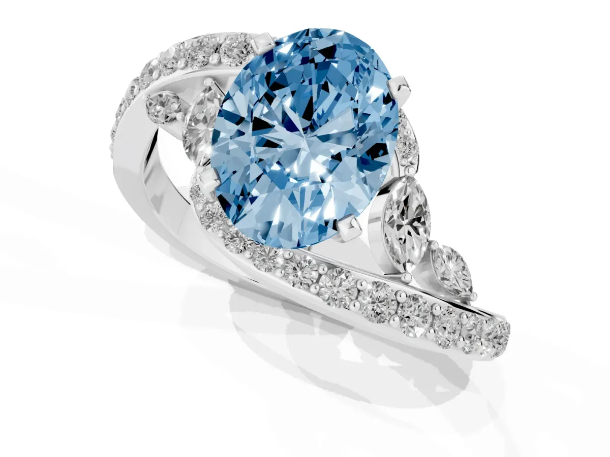 Fancy Blue Oval Cut Solitaire with Pavé Twist Band and Four-Prong Setting Silver