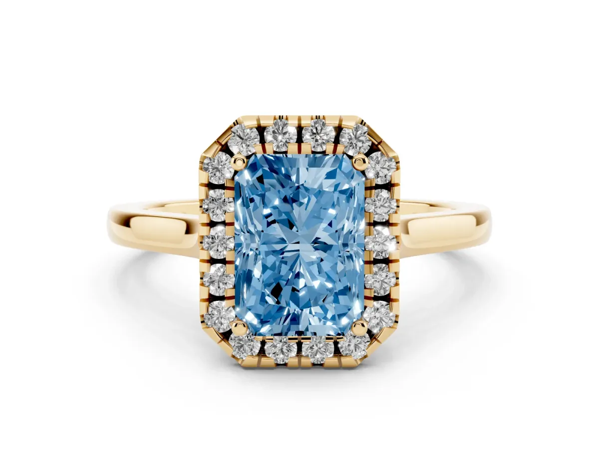 Fancy Blue Radiant Cut Halo Round Diamond Solitaire Ring with Pavé Band and Four-Prong Setting Yellow gold