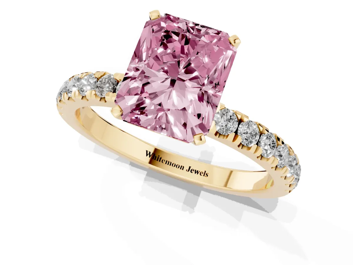 Fancy Pink Radiant Cut Diamond Solitaire Ring with Pavé Accents and Four-Prong Setting Yellow gold
